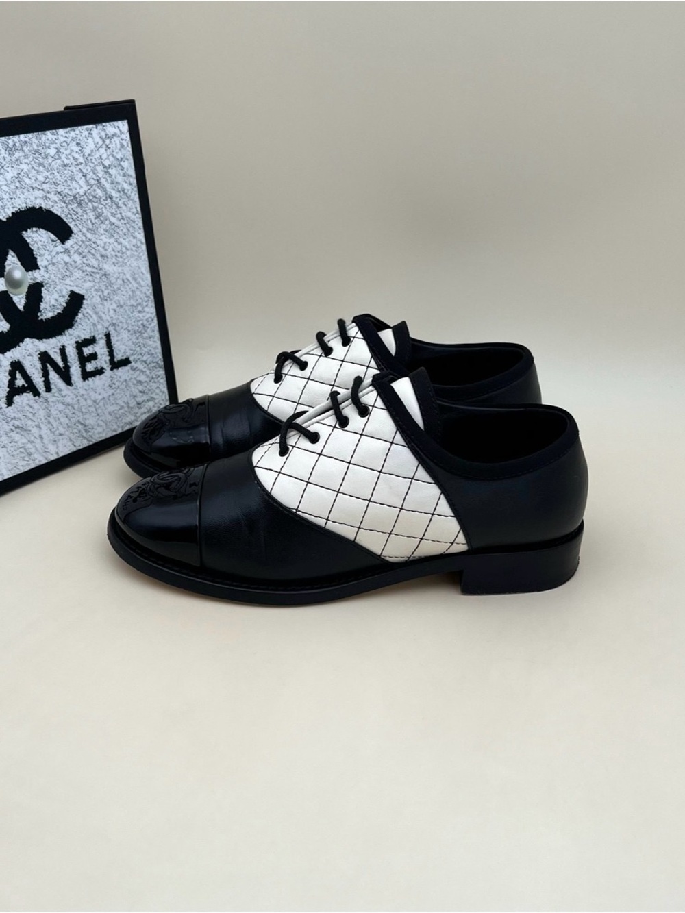 CHANEL Black & White Quilted Leather Oxford Shoes